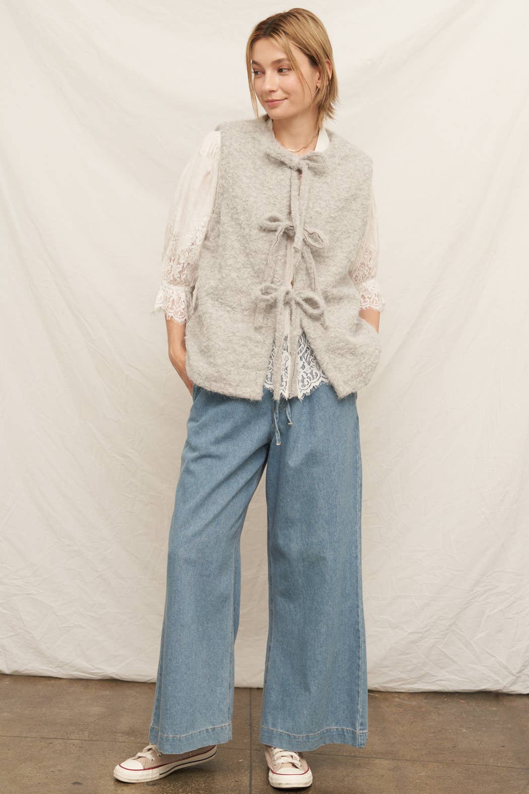 full length thick warm cozy gray sweater vest with front ribbon ties