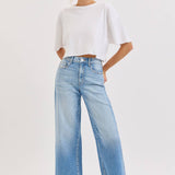 high rise wide leg jeans, light wash wide leg jeans, cropped wide leg denim, raw hem jeans, women's high rise jeans, light wash denim pants, stretchy wide leg jeans, everyday denim, cropped jeans women, casual blue jeans