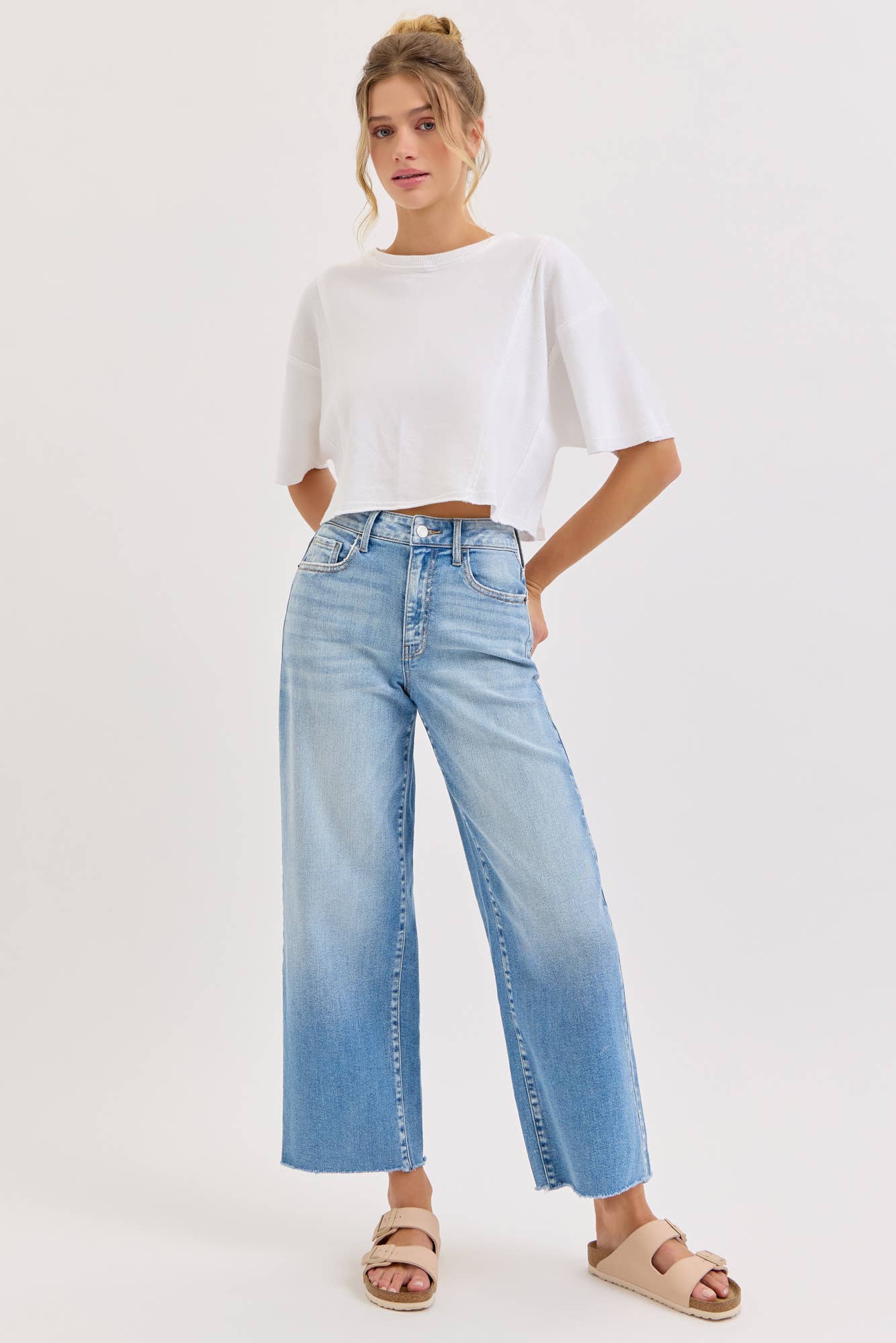 high rise wide leg jeans, light wash wide leg jeans, cropped wide leg denim, raw hem jeans, women's high rise jeans, light wash denim pants, stretchy wide leg jeans, everyday denim, cropped jeans women, casual blue jeans
