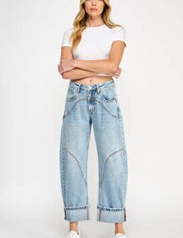 light wash high rise barrel jeans with curved statement seams and wide cuffed hems. available in sizes 1–15 and 1xl–3xl.