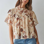 women's cream floral blouse, cream and brown floral top, brown floral blouse women, floral mock neck blouse, fall floral blouse, women's chiffon floral top, short sleeve floral blouse, flutter sleeve floral top, vintage floral blouse, western floral blouse, prairie floral top, boho western blouse, women's fall blouse, neutral floral top, cream fall top women, brown floral fall top, floral top with jeans, western fall outfit women, cowgirl fall outfit, women's western clothing, women's boutique tops