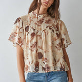 women's cream floral blouse, cream and brown floral top, brown floral blouse women, floral mock neck blouse, fall floral blouse, women's chiffon floral top, short sleeve floral blouse, flutter sleeve floral top, vintage floral blouse, western floral blouse, prairie floral top, boho western blouse, women's fall blouse, neutral floral top, cream fall top women, brown floral fall top, floral top with jeans, western fall outfit women, cowgirl fall outfit, women's western clothing, women's boutique tops