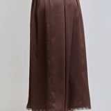 chocolate satin wide leg pants with an elastic waist, pockets and delicate lace detailing. wear them alone or pair with the matching top, sold separately.