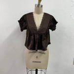 chocolate brown satin v-neck top with lace trim, empire waist and short flutter sleeves