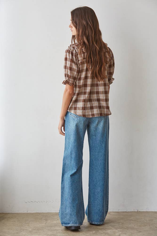 women's brown plaid top, brown plaid blouse, brown and cream plaid top, plaid ruffle blouse, ruffle v neck top, women's plaid fall top, western plaid top, cowgirl plaid shirt, puff sleeve plaid blouse, women's western top, brown fall blouse, country concert outfit women, western fall outfit women, plaid matching set women, matching top and skirt set, brown plaid matching set, fall matching set women, western matching set, plaid top with jeans, fall top with cowboy boots, women's boutique fall clothing