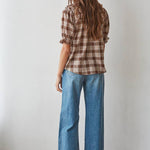 women's brown plaid top, brown plaid blouse, brown and cream plaid top, plaid ruffle blouse, ruffle v neck top, women's plaid fall top, western plaid top, cowgirl plaid shirt, puff sleeve plaid blouse, women's western top, brown fall blouse, country concert outfit women, western fall outfit women, plaid matching set women, matching top and skirt set, brown plaid matching set, fall matching set women, western matching set, plaid top with jeans, fall top with cowboy boots, women's boutique fall clothing