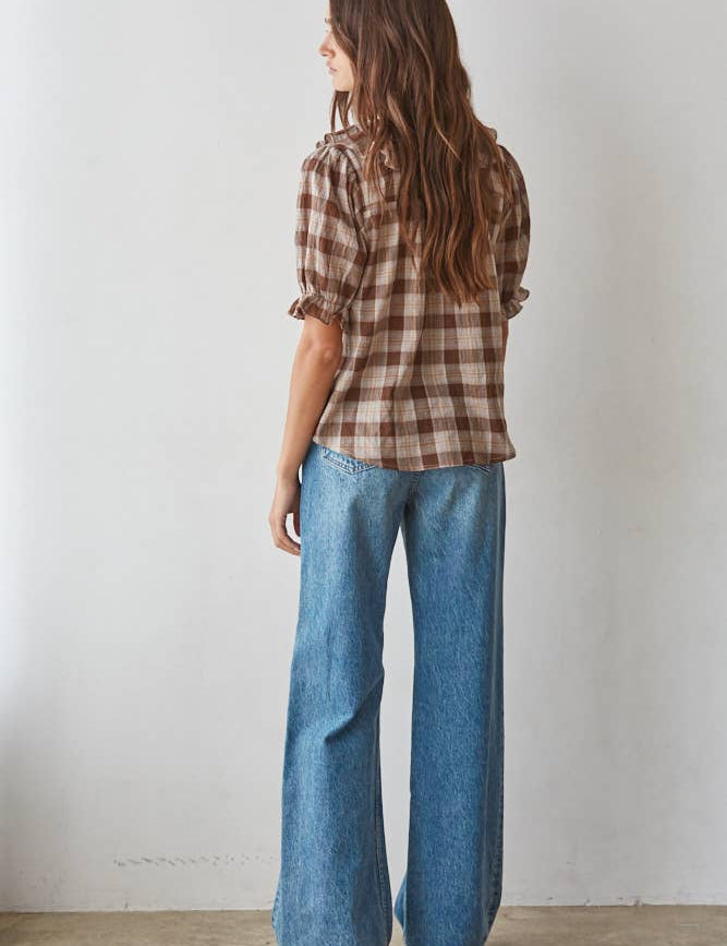 women's brown plaid top, brown plaid blouse, brown and cream plaid top, plaid ruffle blouse, ruffle v neck top, women's plaid fall top, western plaid top, cowgirl plaid shirt, puff sleeve plaid blouse, women's western top, brown fall blouse, country concert outfit women, western fall outfit women, plaid matching set women, matching top and skirt set, brown plaid matching set, fall matching set women, western matching set, plaid top with jeans, fall top with cowboy boots, women's boutique fall clothing