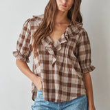 women's brown plaid top, brown plaid blouse, brown and cream plaid top, plaid ruffle blouse, ruffle v neck top, women's plaid fall top, western plaid top, cowgirl plaid shirt, puff sleeve plaid blouse, women's western top, brown fall blouse, country concert outfit women, western fall outfit women, plaid matching set women, matching top and skirt set, brown plaid matching set, fall matching set women, western matching set, plaid top with jeans, fall top with cowboy boots, women's boutique fall clothing