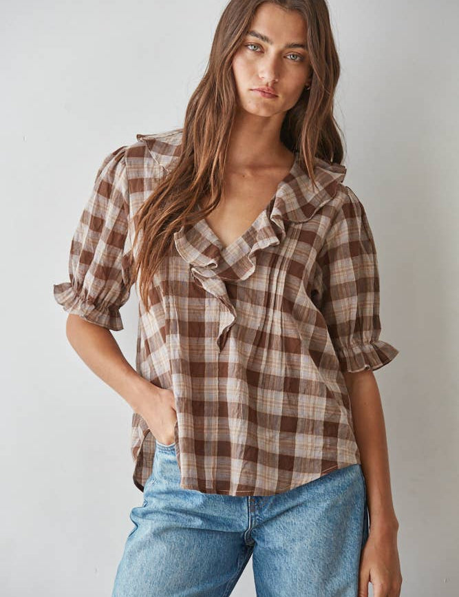 women's brown plaid top, brown plaid blouse, brown and cream plaid top, plaid ruffle blouse, ruffle v neck top, women's plaid fall top, western plaid top, cowgirl plaid shirt, puff sleeve plaid blouse, women's western top, brown fall blouse, country concert outfit women, western fall outfit women, plaid matching set women, matching top and skirt set, brown plaid matching set, fall matching set women, western matching set, plaid top with jeans, fall top with cowboy boots, women's boutique fall clothing