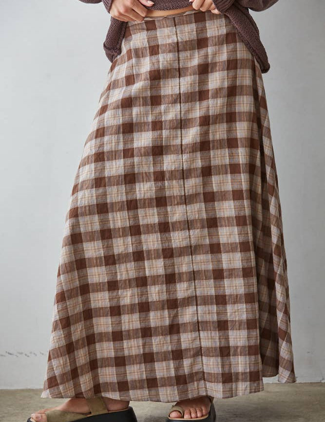a brown and cream plaid midi skirt with a full flared silhouette and elastic back waistband. wear it alone or pair with the matching Antelope Top.