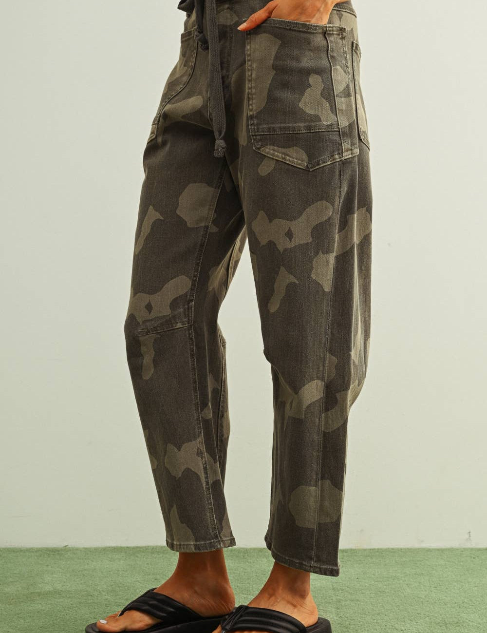 camouflage straight leg utility pants with drawstring waist
washed camo cotton twill pants with patch pockets
relaxed fit camouflage pants for women
cropped straight leg camo utility pants
cotton stretch cargo-inspired pants with adjustable waist
olive camouflage casual pants with front patch pockets
relaxed camouflage trousers styled with black tank
utility-inspired camo pants with drawstring belt