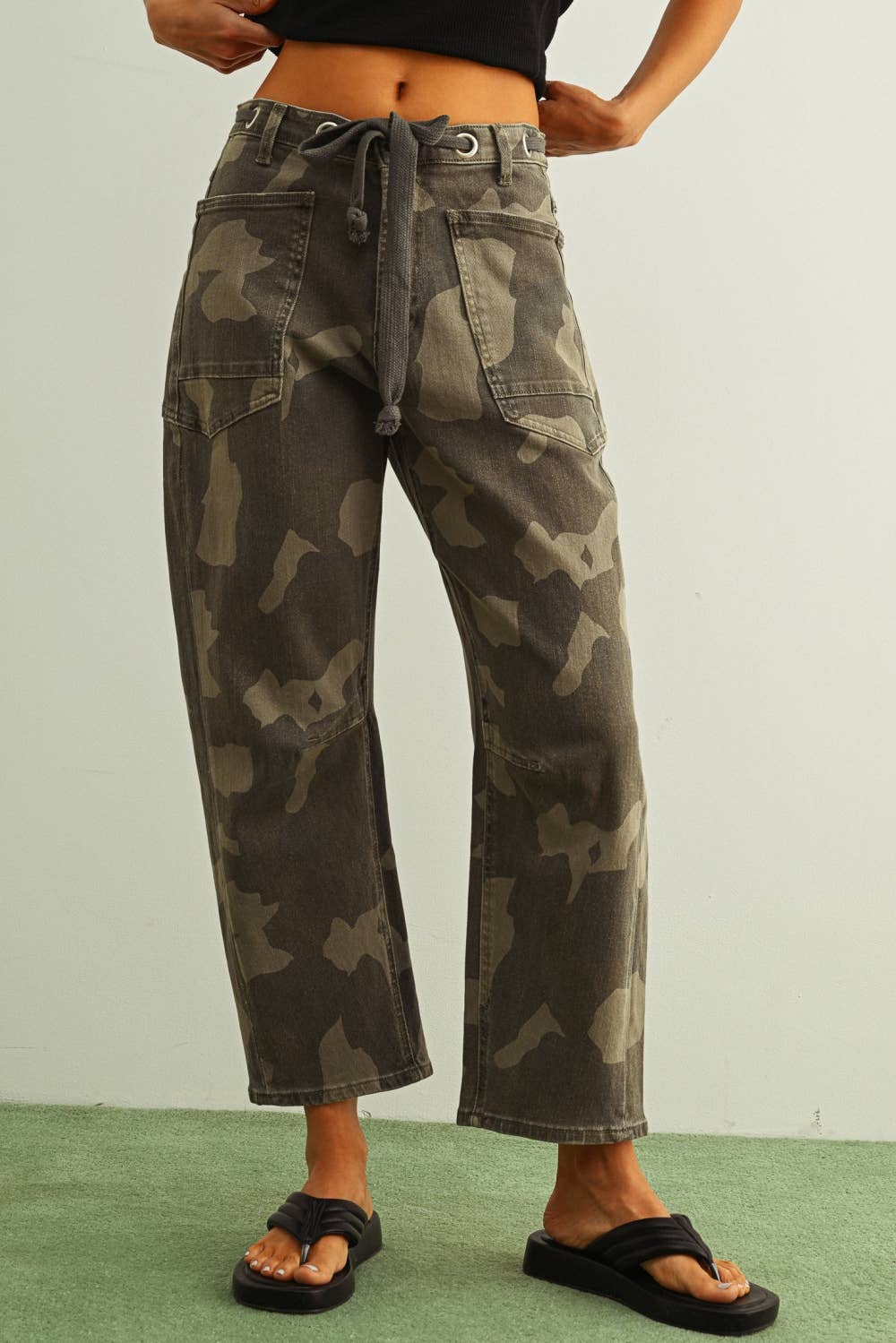 camouflage straight leg utility pants with drawstring waist
washed camo cotton twill pants with patch pockets
relaxed fit camouflage pants for women
cropped straight leg camo utility pants
cotton stretch cargo-inspired pants with adjustable waist
olive camouflage casual pants with front patch pockets
relaxed camouflage trousers styled with black tank
utility-inspired camo pants with drawstring belt