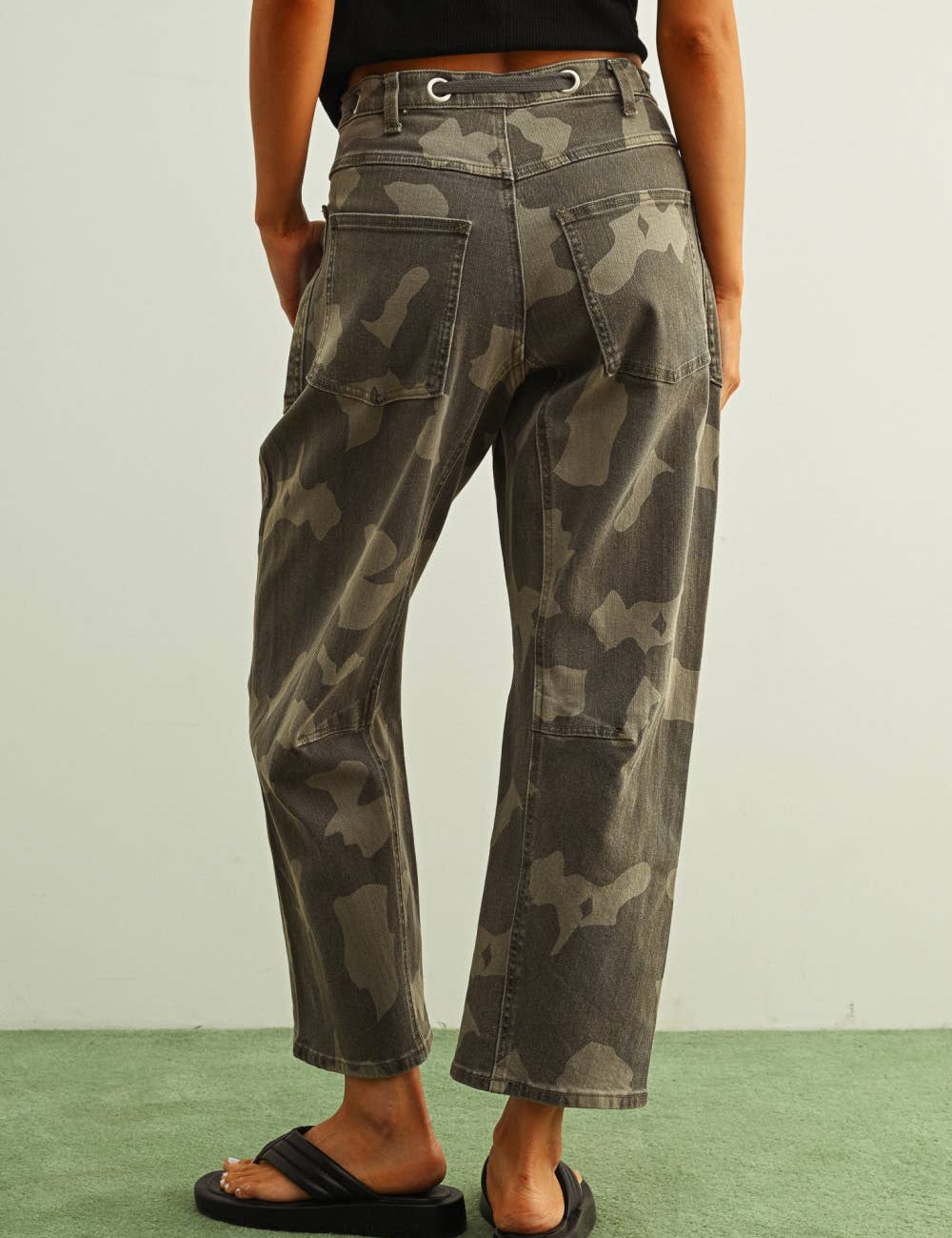 camouflage straight leg utility pants with drawstring waist
washed camo cotton twill pants with patch pockets
relaxed fit camouflage pants for women
cropped straight leg camo utility pants
cotton stretch cargo-inspired pants with adjustable waist
olive camouflage casual pants with front patch pockets
relaxed camouflage trousers styled with black tank
utility-inspired camo pants with drawstring belt