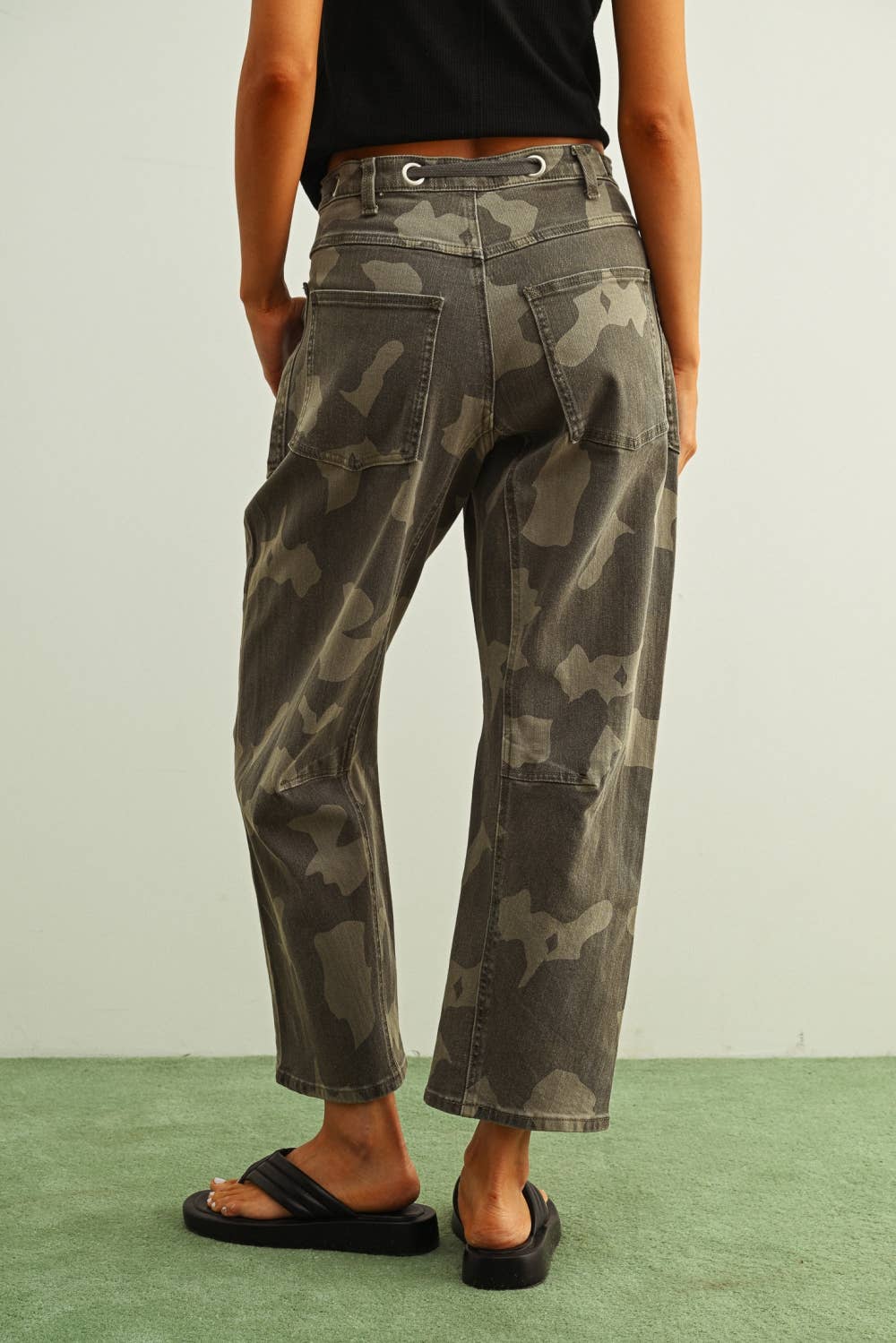 camouflage straight leg utility pants with drawstring waist
washed camo cotton twill pants with patch pockets
relaxed fit camouflage pants for women
cropped straight leg camo utility pants
cotton stretch cargo-inspired pants with adjustable waist
olive camouflage casual pants with front patch pockets
relaxed camouflage trousers styled with black tank
utility-inspired camo pants with drawstring belt