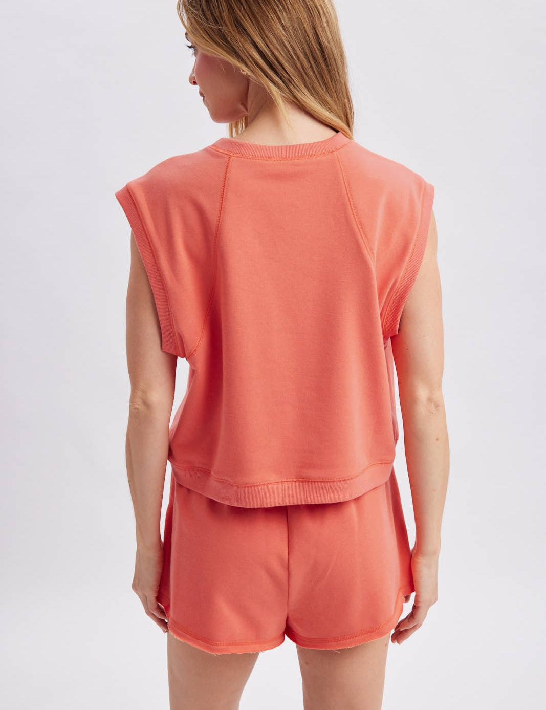 coral muscle tank women
matching lounge set tank
casual summer tank top
vacation outfit women
relaxed muscle tee women
coastal lounge set top
soft cotton blend tank
travel outfit women
resort wear separates
west of may spritz collection
