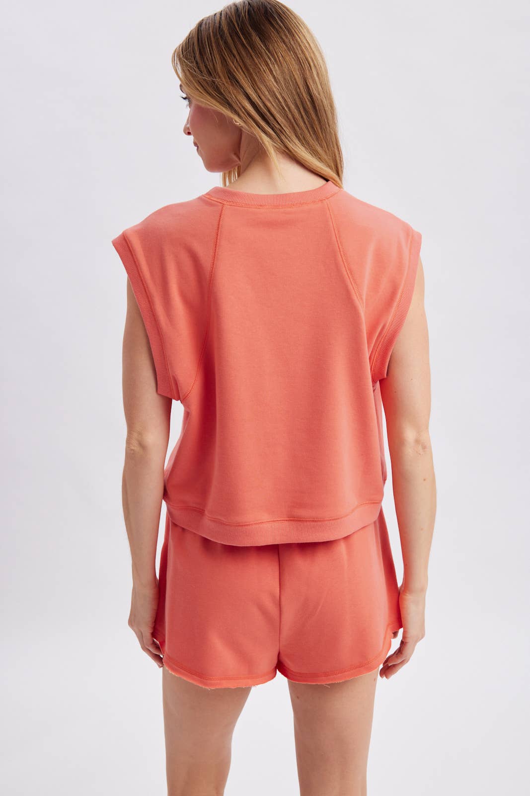 coral muscle tank women
matching lounge set tank
casual summer tank top
vacation outfit women
relaxed muscle tee women
coastal lounge set top
soft cotton blend tank
travel outfit women
resort wear separates
west of may spritz collection