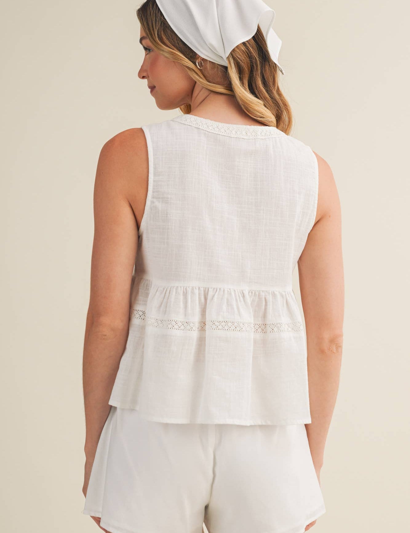 embroidered floral vest, tie front peplum top, white embroidered blouse, cottagecore vest top, lace trim sleeveless top, floral embroidered tank, boho peplum vest, embroidered cotton top, feminine tie front blouse, white summer vest