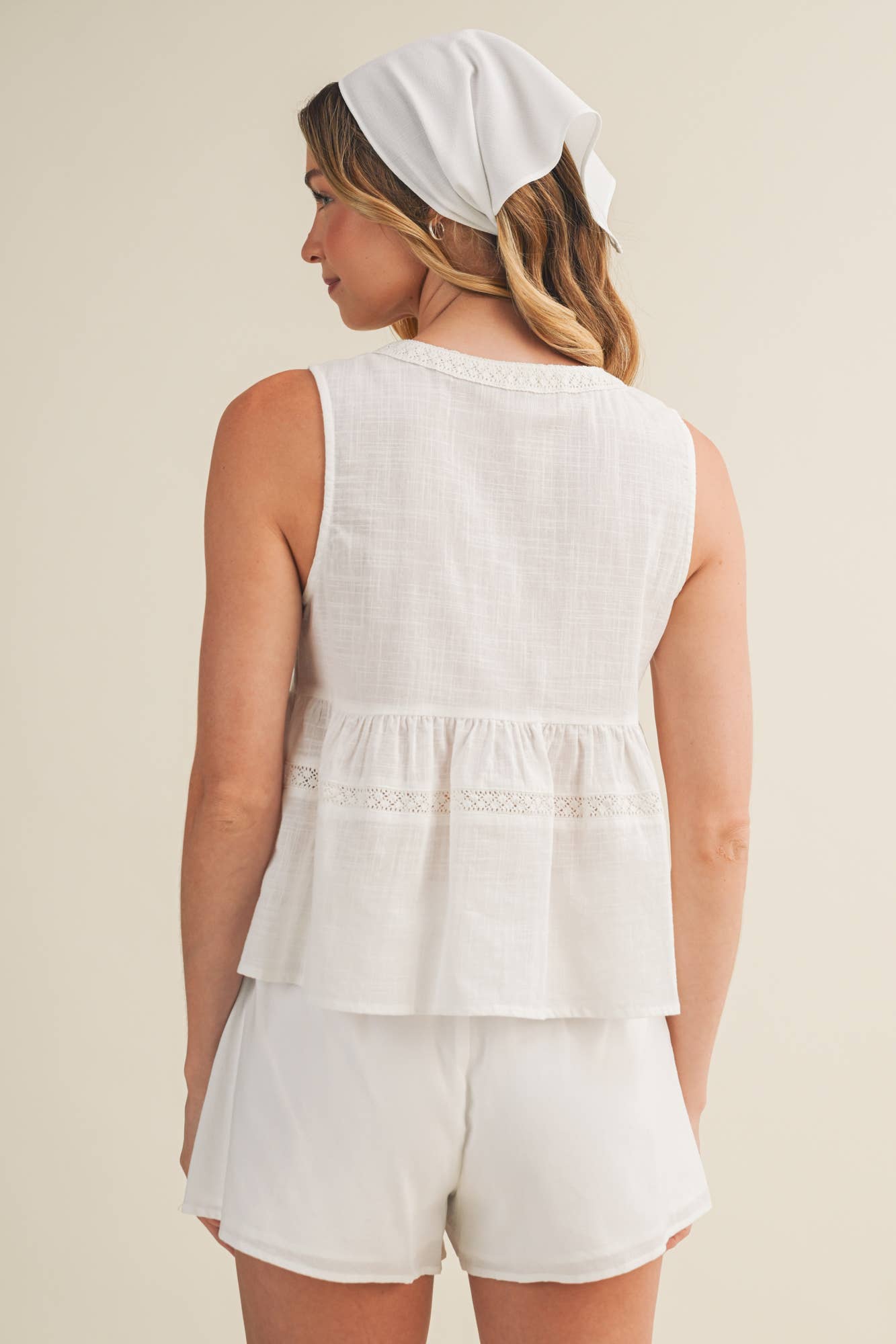 embroidered floral vest, tie front peplum top, white embroidered blouse, cottagecore vest top, lace trim sleeveless top, floral embroidered tank, boho peplum vest, embroidered cotton top, feminine tie front blouse, white summer vest