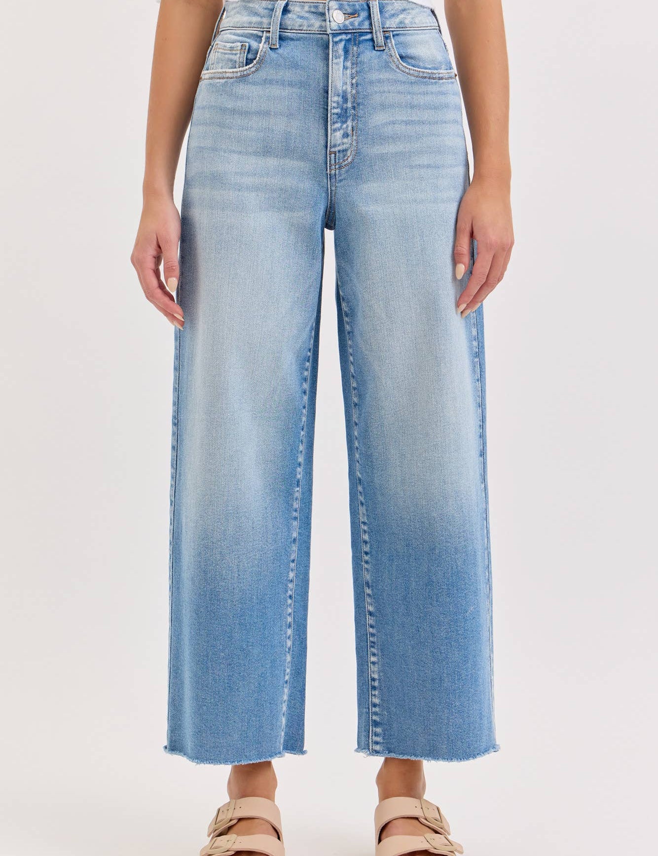 high rise wide leg jeans, light wash wide leg jeans, cropped wide leg denim, raw hem jeans, women's high rise jeans, light wash denim pants, stretchy wide leg jeans, everyday denim, cropped jeans women, casual blue jeans