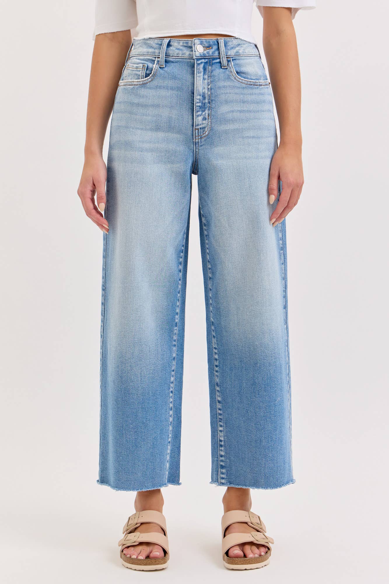 high rise wide leg jeans, light wash wide leg jeans, cropped wide leg denim, raw hem jeans, women's high rise jeans, light wash denim pants, stretchy wide leg jeans, everyday denim, cropped jeans women, casual blue jeans
