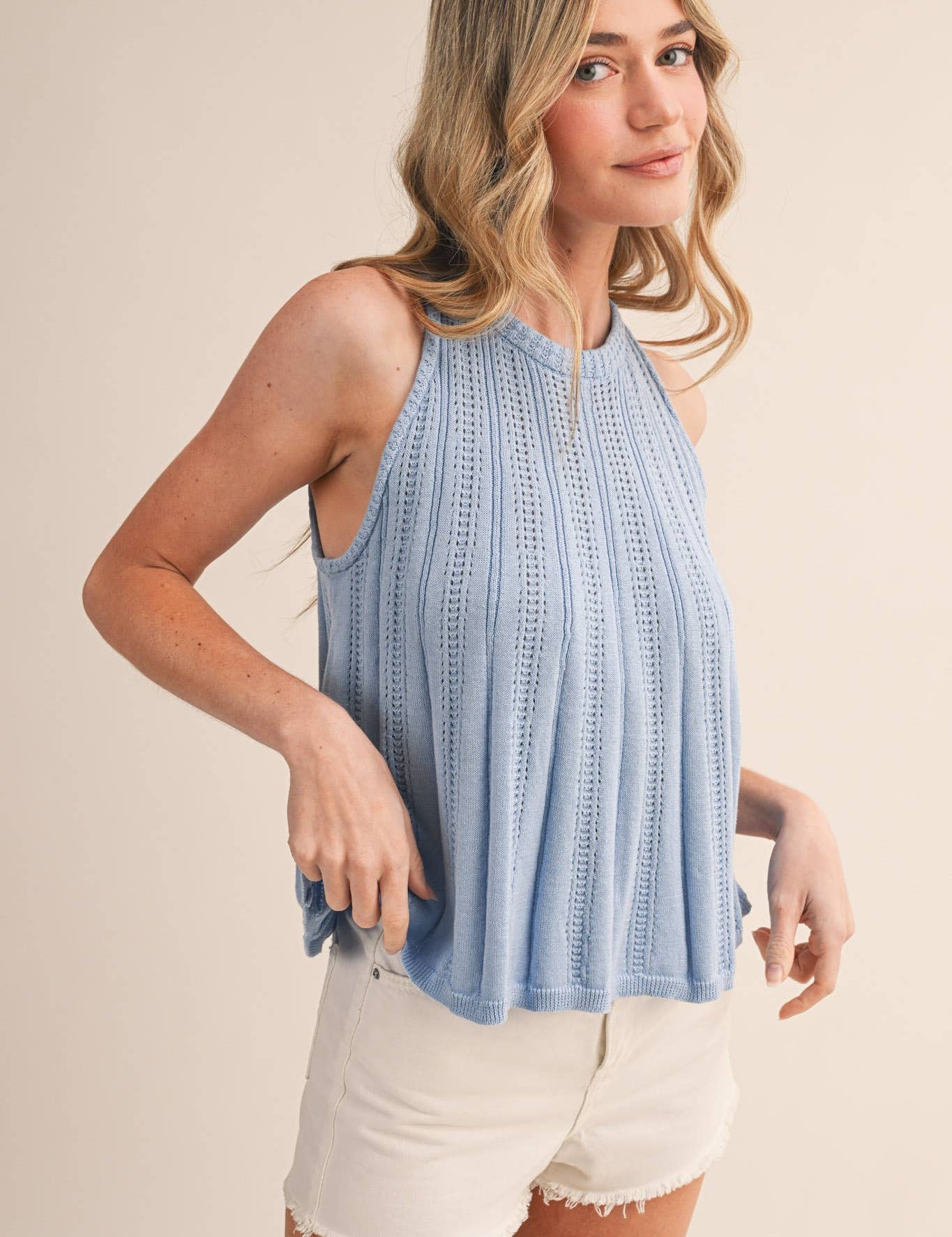 blue pointelle sweater tank
sleeveless knit tank women
lightweight sweater knit tank
round neck summer knit top
soft blue sleeveless sweater top
pointelle knit summer tank
women’s swing knit tank
coastal summer knit top
elevated casual summer top
summer spritz collection top