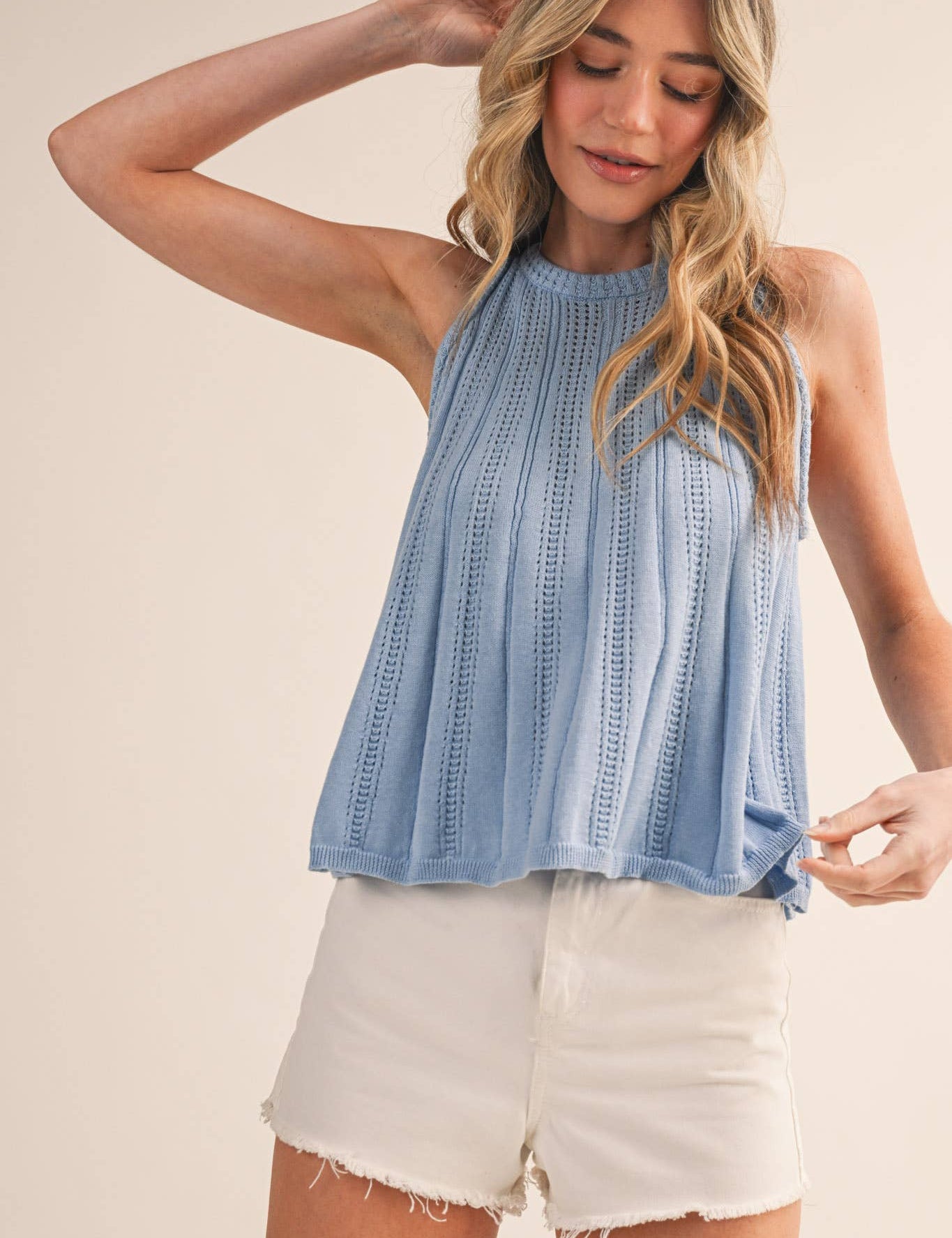 blue pointelle sweater tank
sleeveless knit tank women
lightweight sweater knit tank
round neck summer knit top
soft blue sleeveless sweater top
pointelle knit summer tank
women’s swing knit tank
coastal summer knit top
elevated casual summer top
summer spritz collection top