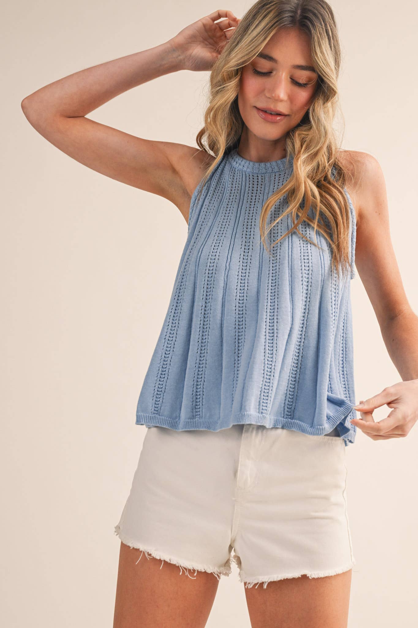 blue pointelle sweater tank
sleeveless knit tank women
lightweight sweater knit tank
round neck summer knit top
soft blue sleeveless sweater top
pointelle knit summer tank
women’s swing knit tank
coastal summer knit top
elevated casual summer top
summer spritz collection top