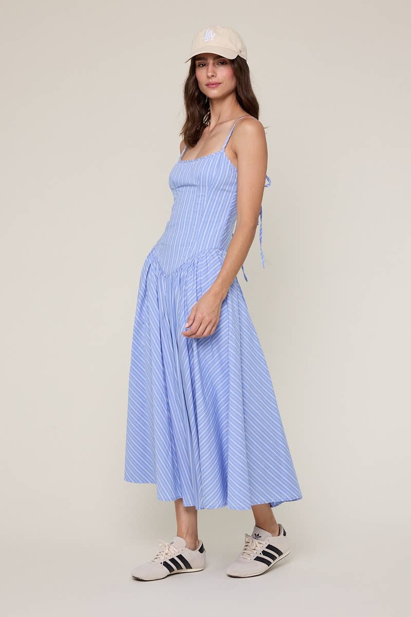 blue striped midi dress
pale blue summer dress
americana summer outfit
southern summer style
fit and flare midi dress
striped sundress for women
classic americana fashion
fourth of july outfit women
feminine summer midi dress
coastal countryside style
adjustable strap midi dress
blue and white striped dress
casual summer boutique dress
nostalgic summer fashion
east tennessee boutique clothing
summer picnic dress
farmhouse summer outfit
lightweight summer midi dress
romantic summer dress
countryside summer a