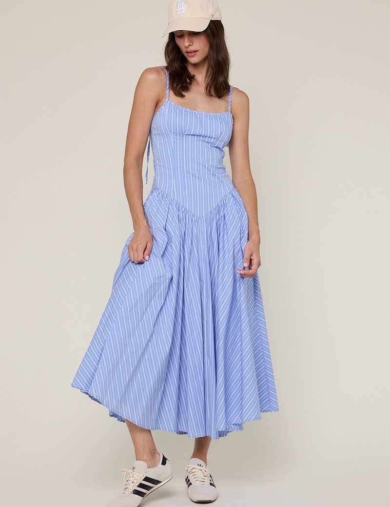 blue striped midi dress
pale blue summer dress
americana summer outfit
southern summer style
fit and flare midi dress
striped sundress for women
classic americana fashion
fourth of july outfit women
feminine summer midi dress
coastal countryside style
adjustable strap midi dress
blue and white striped dress
casual summer boutique dress
nostalgic summer fashion
east tennessee boutique clothing
summer picnic dress
farmhouse summer outfit
lightweight summer midi dress
romantic summer dress
countryside summer a