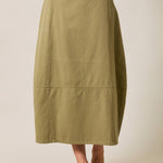 olive cotton twill barrel midi skirt, women's utility midi skirt, casual olive skirt, modern barrel silhouette skirt, everyday cotton twill skirt, modest midi skirt, fall wardrobe staple, Appalachian style clothing, West of May boutique