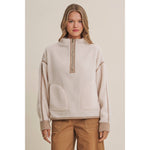 ivory sherpa fleece half zip pullover with brown gingham trim, front patch pockets, and adjustable drawcord hem