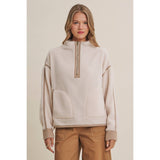 ivory sherpa fleece half zip pullover with brown gingham trim, front patch pockets, and adjustable drawcord hem