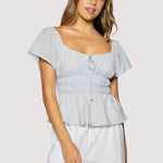 light blue peplum top women
square neck flutter sleeve top
feminine fitted summer blouse
romantic blue going out top
elevated casual boutique top
date night summer top women
european summer style clothing
light blue waist cinching blouse
west of may spritz collection