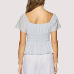 light blue peplum top women
square neck flutter sleeve top
feminine fitted summer blouse
romantic blue going out top
elevated casual boutique top
date night summer top women
european summer style clothing
light blue waist cinching blouse
west of may spritz collection