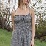 gingham jumpsuit
black and white gingham jumpsuit
cotton wide leg jumpsuit
smocked bodice jumpsuit
adjustable strap jumpsuit
gingham summer outfit
cotton summer jumpsuit
wide leg gingham romper
casual vacation outfit
women's gingham jumpsuit
black gingham outfit
summer travel outfit
relaxed fit jumpsuit
cotton jumpsuit with pockets
boutique women's clothing
comfortable summer jumpsuit
wide leg cotton outfit
southern summer style
gingham fashion trend
elevated casual outfit