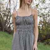 gingham jumpsuit
black and white gingham jumpsuit
cotton wide leg jumpsuit
smocked bodice jumpsuit
adjustable strap jumpsuit
gingham summer outfit
cotton summer jumpsuit
wide leg gingham romper
casual vacation outfit
women's gingham jumpsuit
black gingham outfit
summer travel outfit
relaxed fit jumpsuit
cotton jumpsuit with pockets
boutique women's clothing
comfortable summer jumpsuit
wide leg cotton outfit
southern summer style
gingham fashion trend
elevated casual outfit