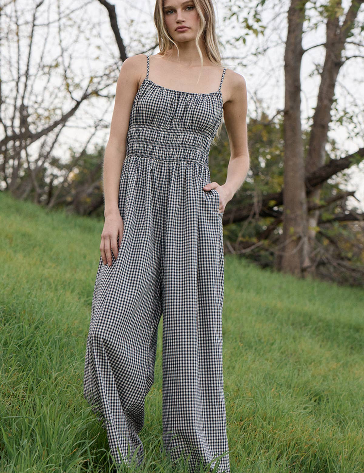 gingham jumpsuit
black and white gingham jumpsuit
cotton wide leg jumpsuit
smocked bodice jumpsuit
adjustable strap jumpsuit
gingham summer outfit
cotton summer jumpsuit
wide leg gingham romper
casual vacation outfit
women's gingham jumpsuit
black gingham outfit
summer travel outfit
relaxed fit jumpsuit
cotton jumpsuit with pockets
boutique women's clothing
comfortable summer jumpsuit
wide leg cotton outfit
southern summer style
gingham fashion trend
elevated casual outfit