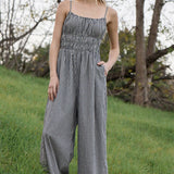 gingham jumpsuit
black and white gingham jumpsuit
cotton wide leg jumpsuit
smocked bodice jumpsuit
adjustable strap jumpsuit
gingham summer outfit
cotton summer jumpsuit
wide leg gingham romper
casual vacation outfit
women's gingham jumpsuit
black gingham outfit
summer travel outfit
relaxed fit jumpsuit
cotton jumpsuit with pockets
boutique women's clothing
comfortable summer jumpsuit
wide leg cotton outfit
southern summer style
gingham fashion trend
elevated casual outfit
