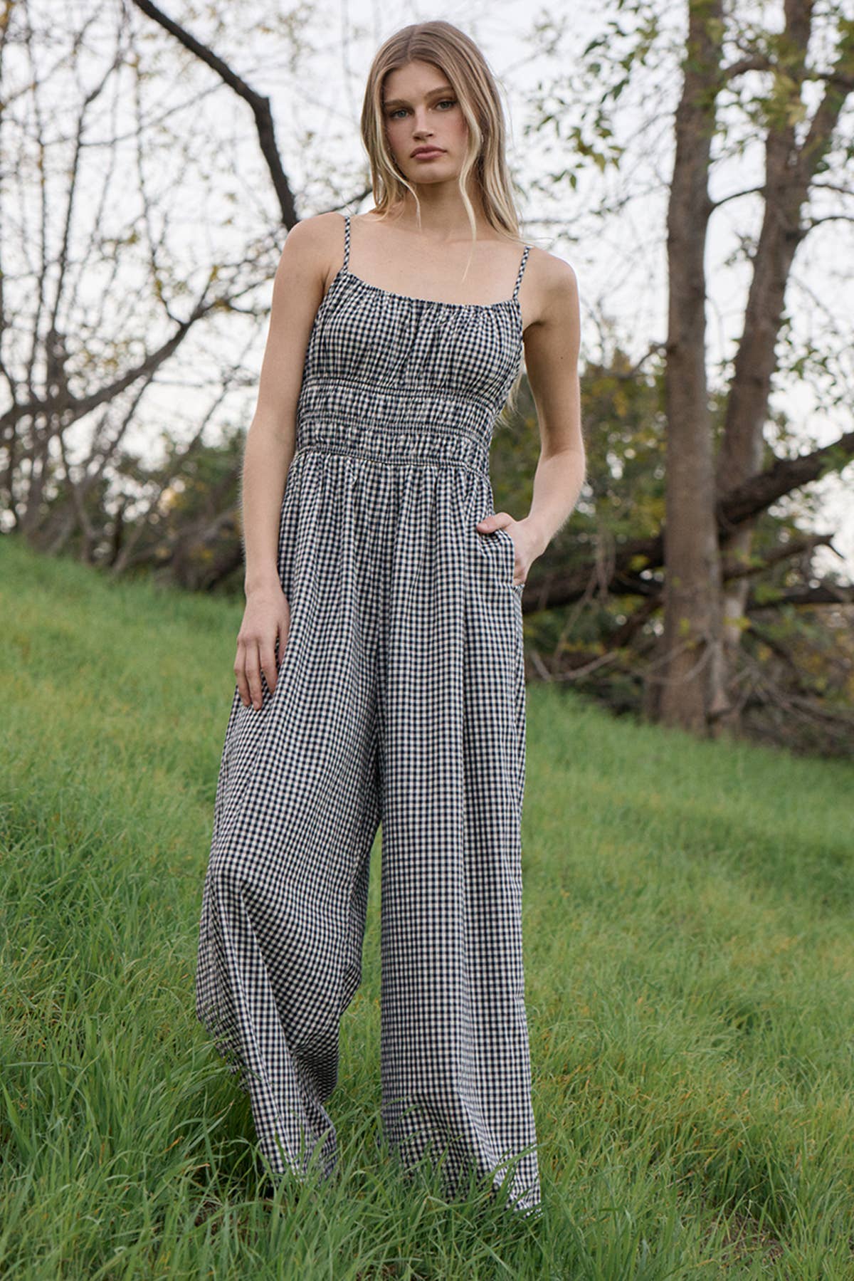 gingham jumpsuit
black and white gingham jumpsuit
cotton wide leg jumpsuit
smocked bodice jumpsuit
adjustable strap jumpsuit
gingham summer outfit
cotton summer jumpsuit
wide leg gingham romper
casual vacation outfit
women's gingham jumpsuit
black gingham outfit
summer travel outfit
relaxed fit jumpsuit
cotton jumpsuit with pockets
boutique women's clothing
comfortable summer jumpsuit
wide leg cotton outfit
southern summer style
gingham fashion trend
elevated casual outfit