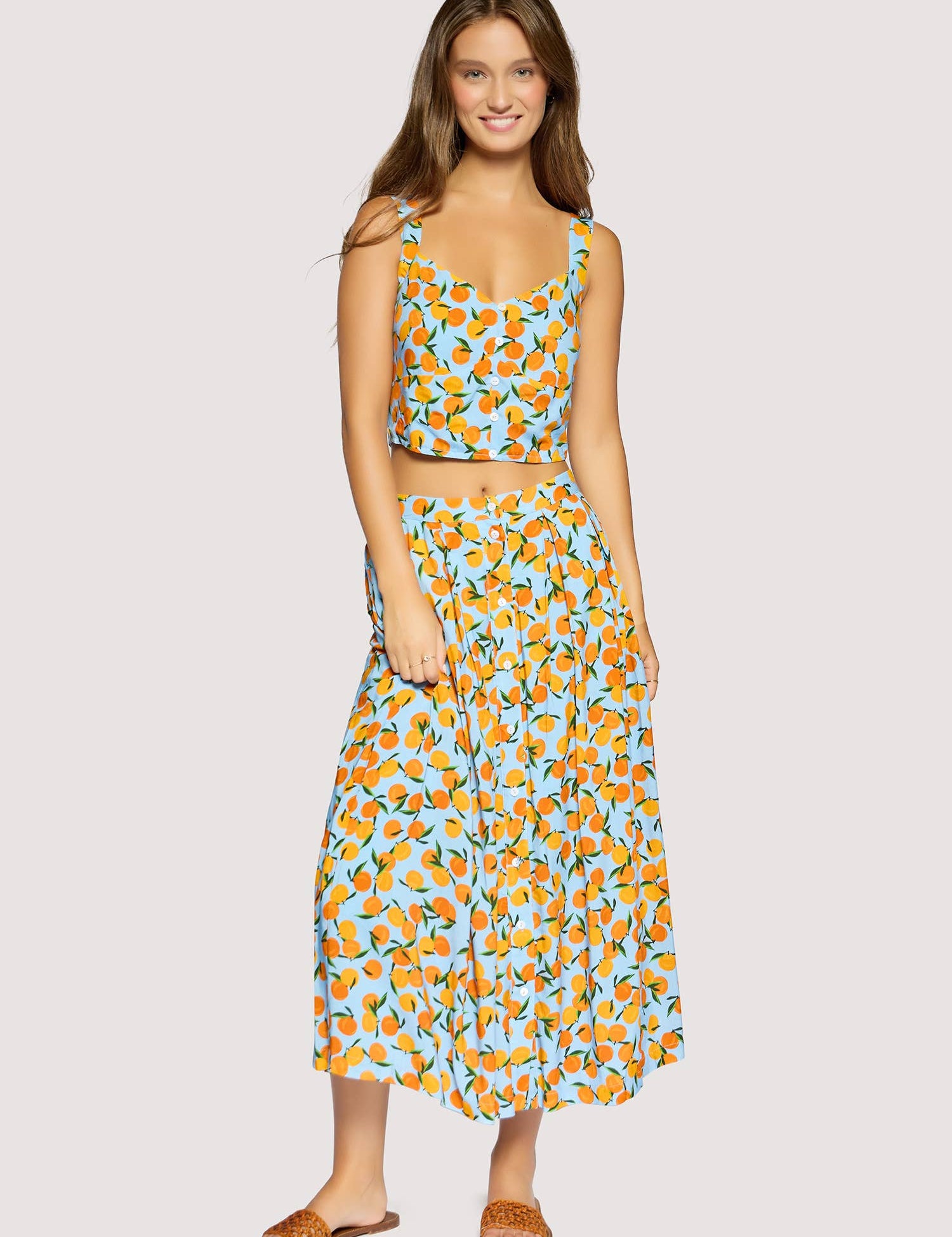 orange print midi skirt women
citrus print summer skirt
button front midi skirt boutique
vacation outfit skirt women
resort wear midi skirt
playful coastal style clothing
rayon linen midi skirt women
matching summer set skirt
european summer boutique fashion
west of may spritz collection