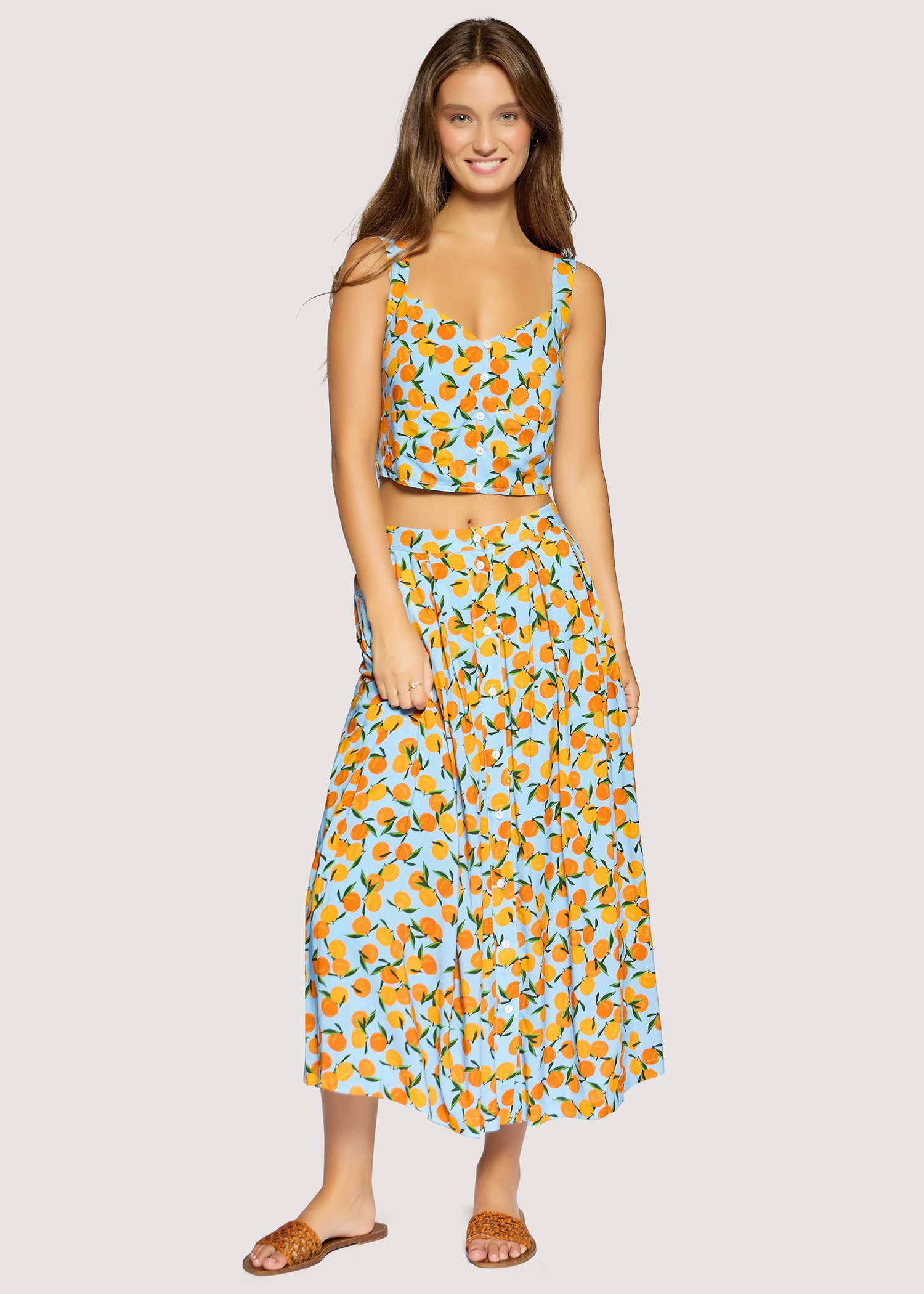 orange print midi skirt women
citrus print summer skirt
button front midi skirt boutique
vacation outfit skirt women
resort wear midi skirt
playful coastal style clothing
rayon linen midi skirt women
matching summer set skirt
european summer boutique fashion
west of may spritz collection