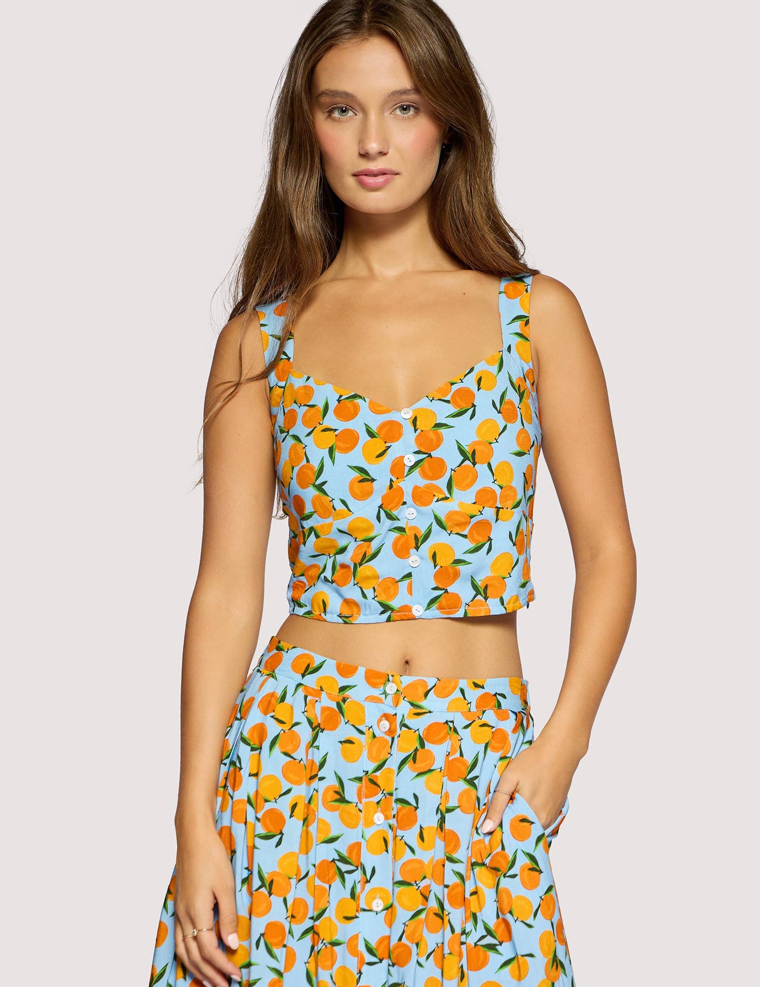orange print crop tank women
citrus print summer top
sweetheart neckline boutique tank
matching summer set women
vacation outfit top women
resort wear boutique clothing
playful summer crop top
blue orange print tank top
european summer outfit women
west of may spritz collection