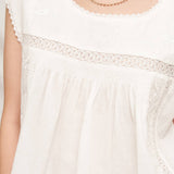 white embroidered blouse
embroidered summer top
white peasant blouse
lightweight rayon blouse
feminine summer top
casual white boutique top
embroidered detail shirt
relaxed fit white blouse
summer farmers market outfit
southern summer style
easy vacation outfit
white top with embroidery
flowy summer blouse
countryside summer fashion
casual feminine clothing
breathable warm weather top
white short sleeve blouse
classic summer wardrobe staple
boutique women's clothing
effortless everyday style