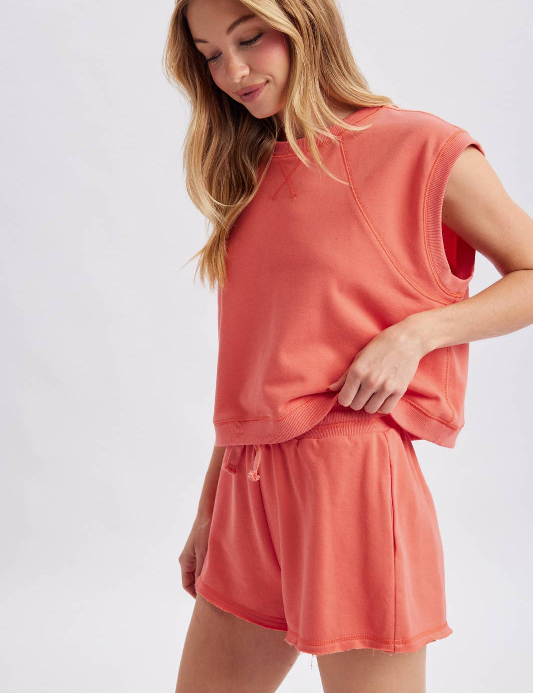 coral muscle tank women
matching lounge set tank
casual summer tank top
vacation outfit women
relaxed muscle tee women
coastal lounge set top
soft cotton blend tank
travel outfit women
resort wear separates
west of may spritz collection