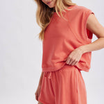 coral muscle tank women
matching lounge set tank
casual summer tank top
vacation outfit women
relaxed muscle tee women
coastal lounge set top
soft cotton blend tank
travel outfit women
resort wear separates
west of may spritz collection