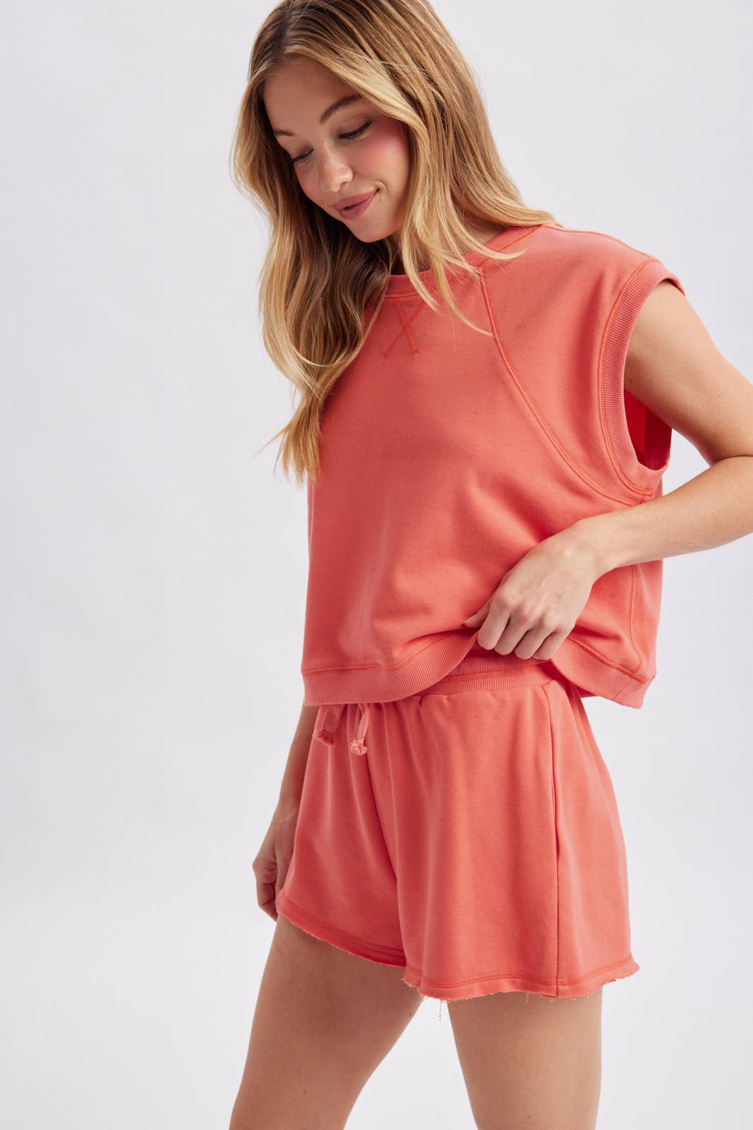 coral muscle tank women
matching lounge set tank
casual summer tank top
vacation outfit women
relaxed muscle tee women
coastal lounge set top
soft cotton blend tank
travel outfit women
resort wear separates
west of may spritz collection