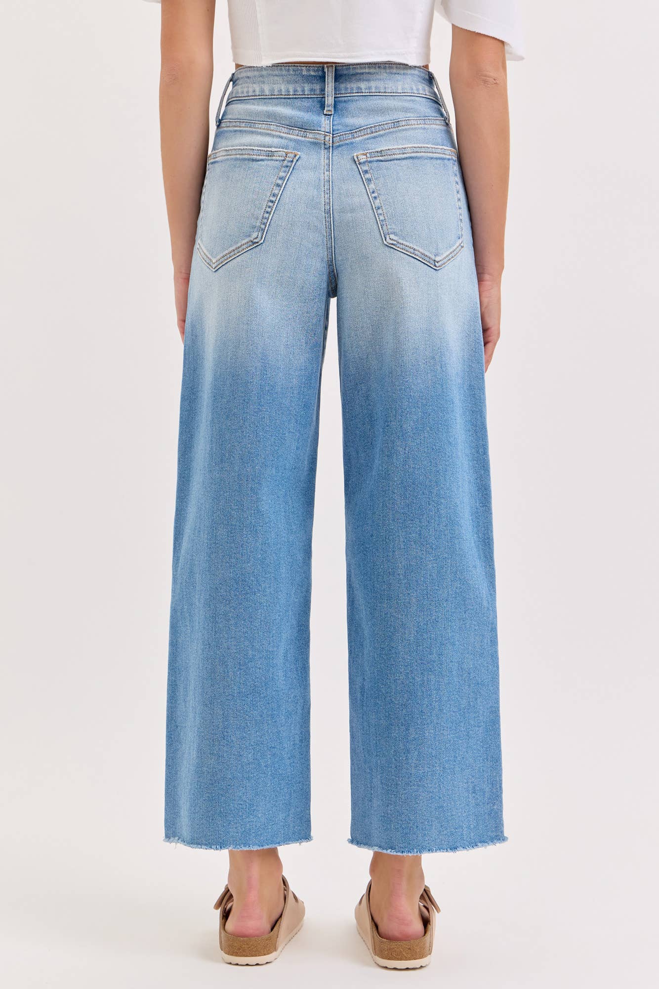 high rise wide leg jeans, light wash wide leg jeans, cropped wide leg denim, raw hem jeans, women's high rise jeans, light wash denim pants, stretchy wide leg jeans, everyday denim, cropped jeans women, casual blue jeans