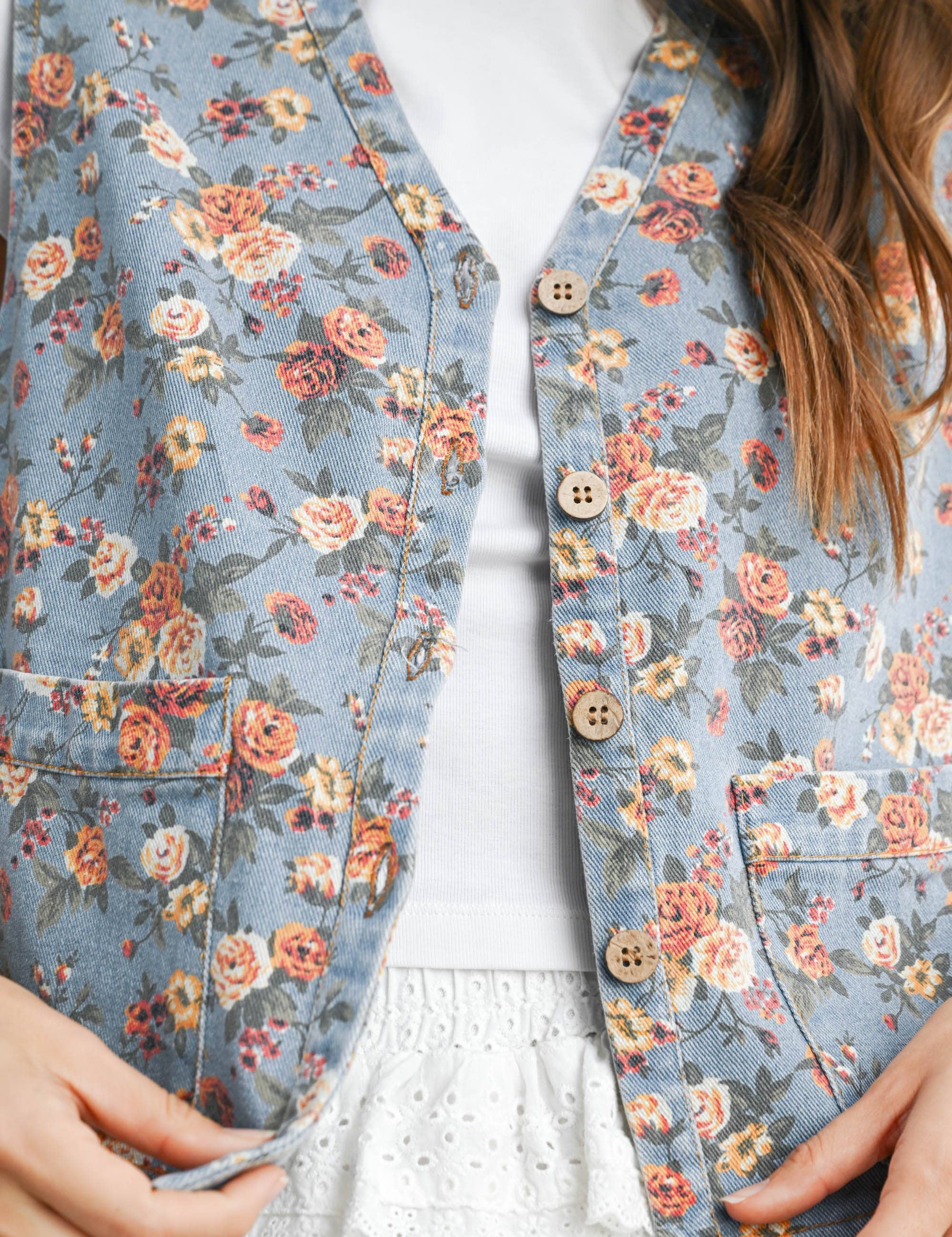 floral tie-front vest, cotton floral vest, women's floral vest, blue floral vest, tie-front vest, cottagecore vest, vintage inspired vest, layering vest, sleeveless floral top, fall layering piece, women's boutique vest, west of may boutique