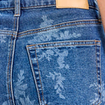 dark wash floral wide leg jeans, high rise floral denim, women's wide leg jeans, embroidered look floral wash denim, boutique denim, relaxed fit jeans, full length wide leg jeans, West of May Boutique