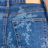 dark wash floral wide leg jeans, high rise floral denim, women's wide leg jeans, embroidered look floral wash denim, boutique denim, relaxed fit jeans, full length wide leg jeans, West of May Boutique